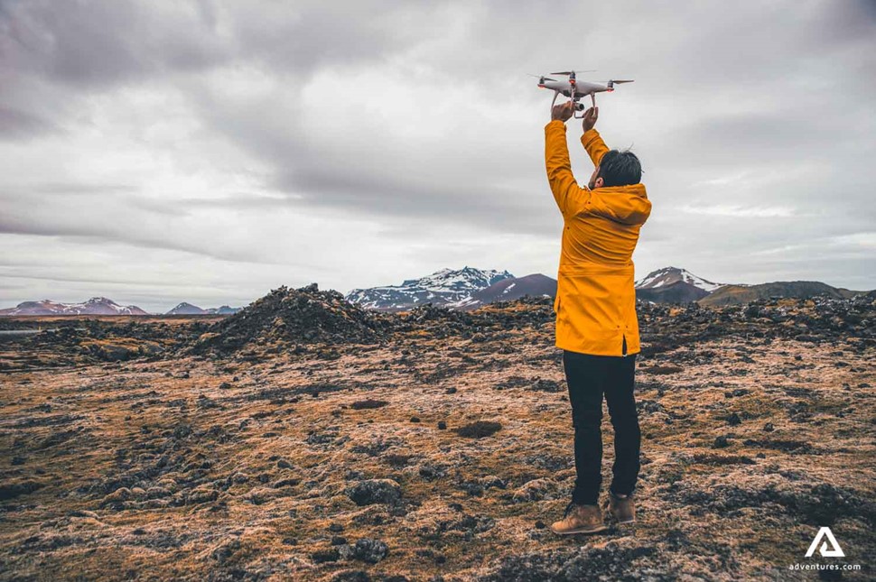 Man holding drone in Iceland