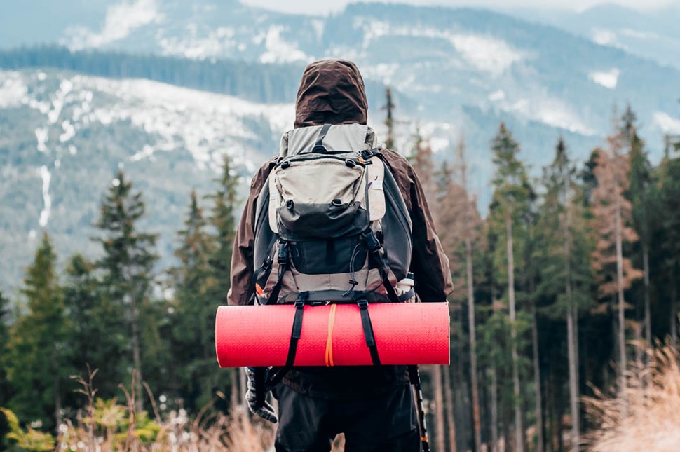 Hiking In Mountains with Backpack in Iceland