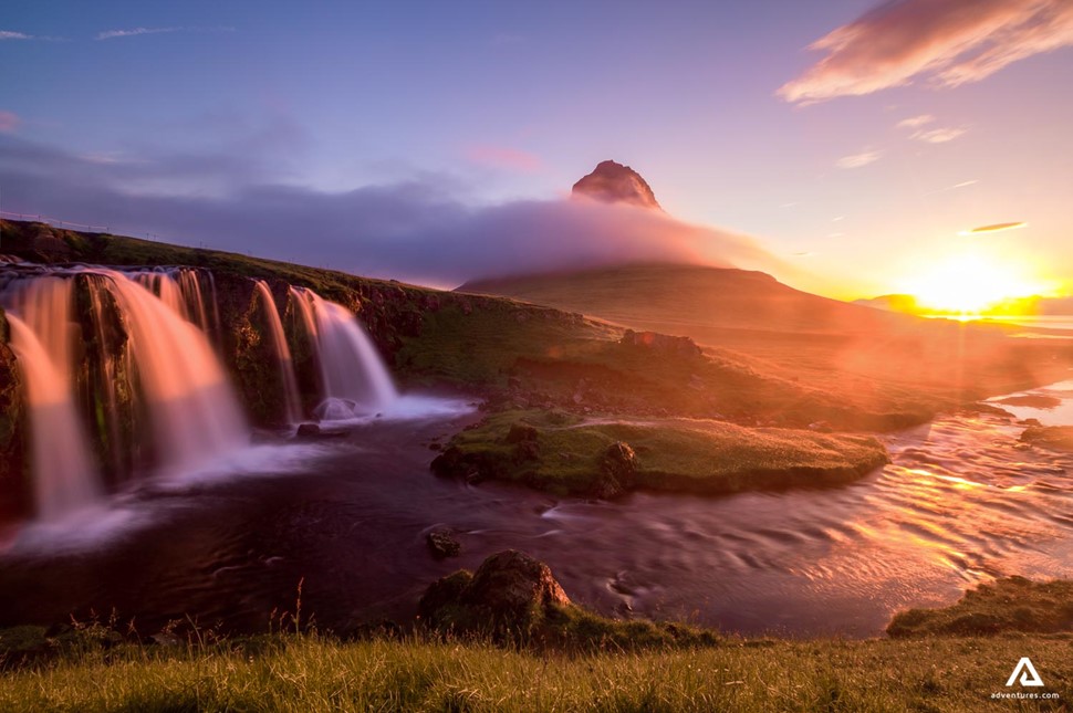 bright colorful sunset at kirkjufell mountain in iceland