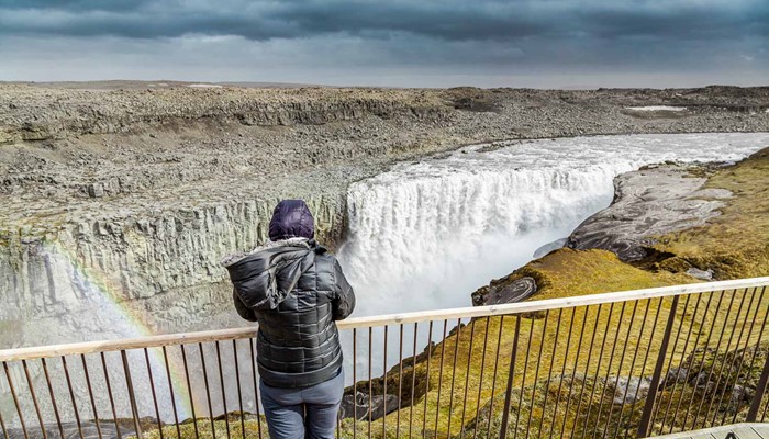 Tourist At Dettifoss Waterfall Lookout Spot