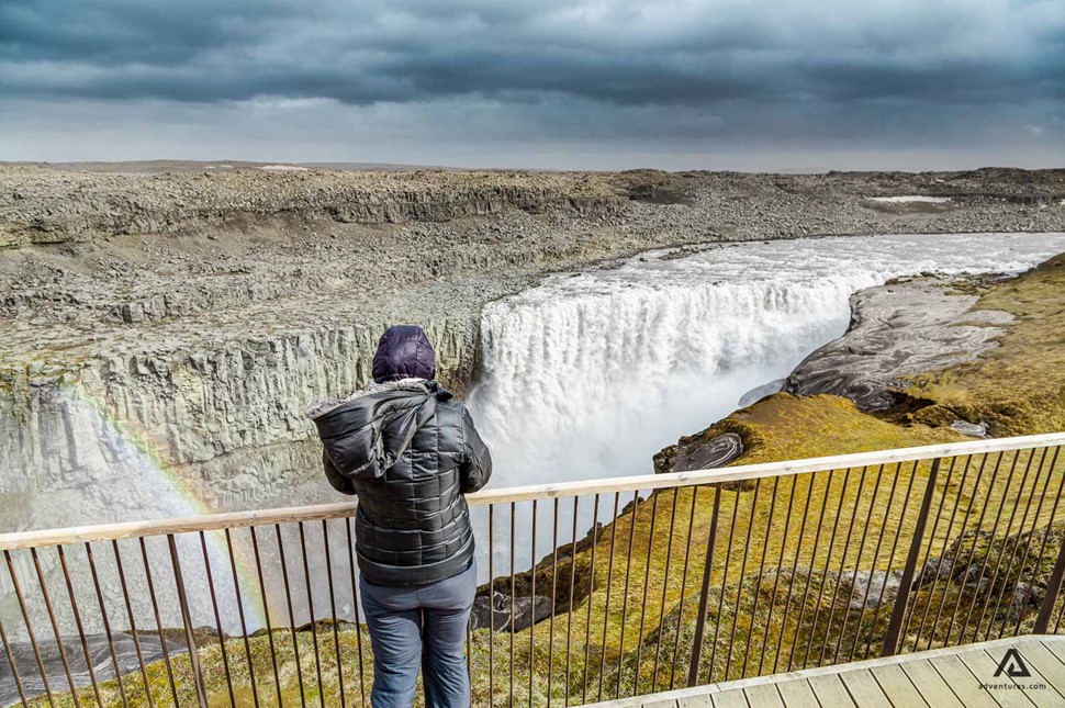 Tourist At Dettifoss Waterfall Lookout Spot