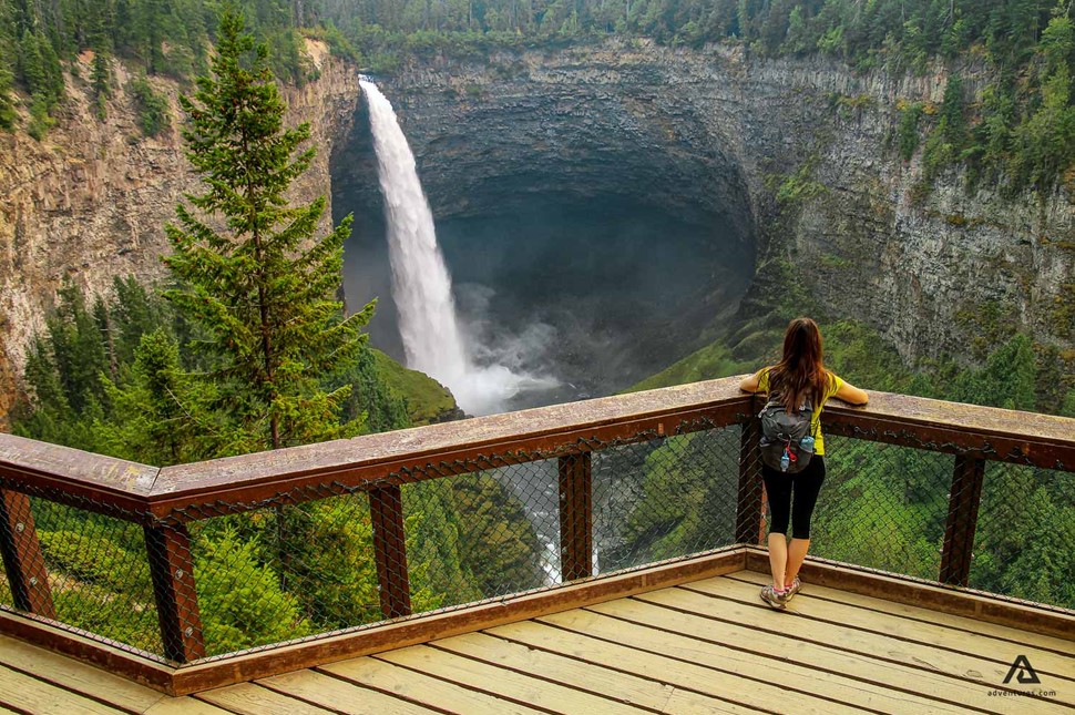 Woman admiring Helmcken Waterfall