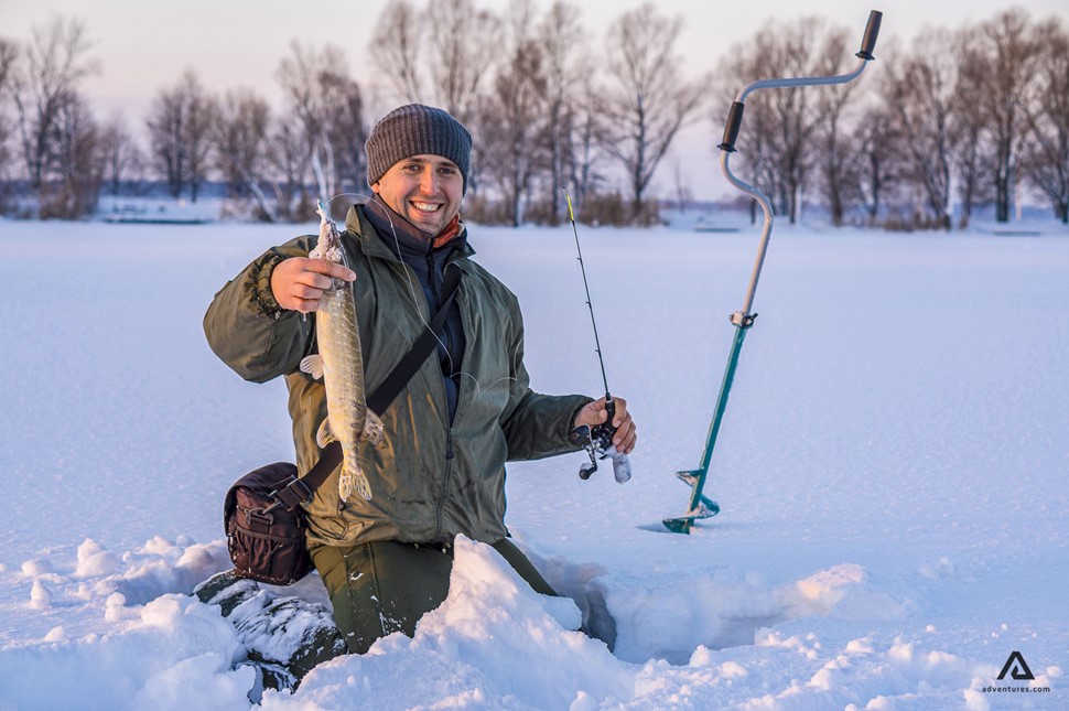 Man caught fish in Canada
