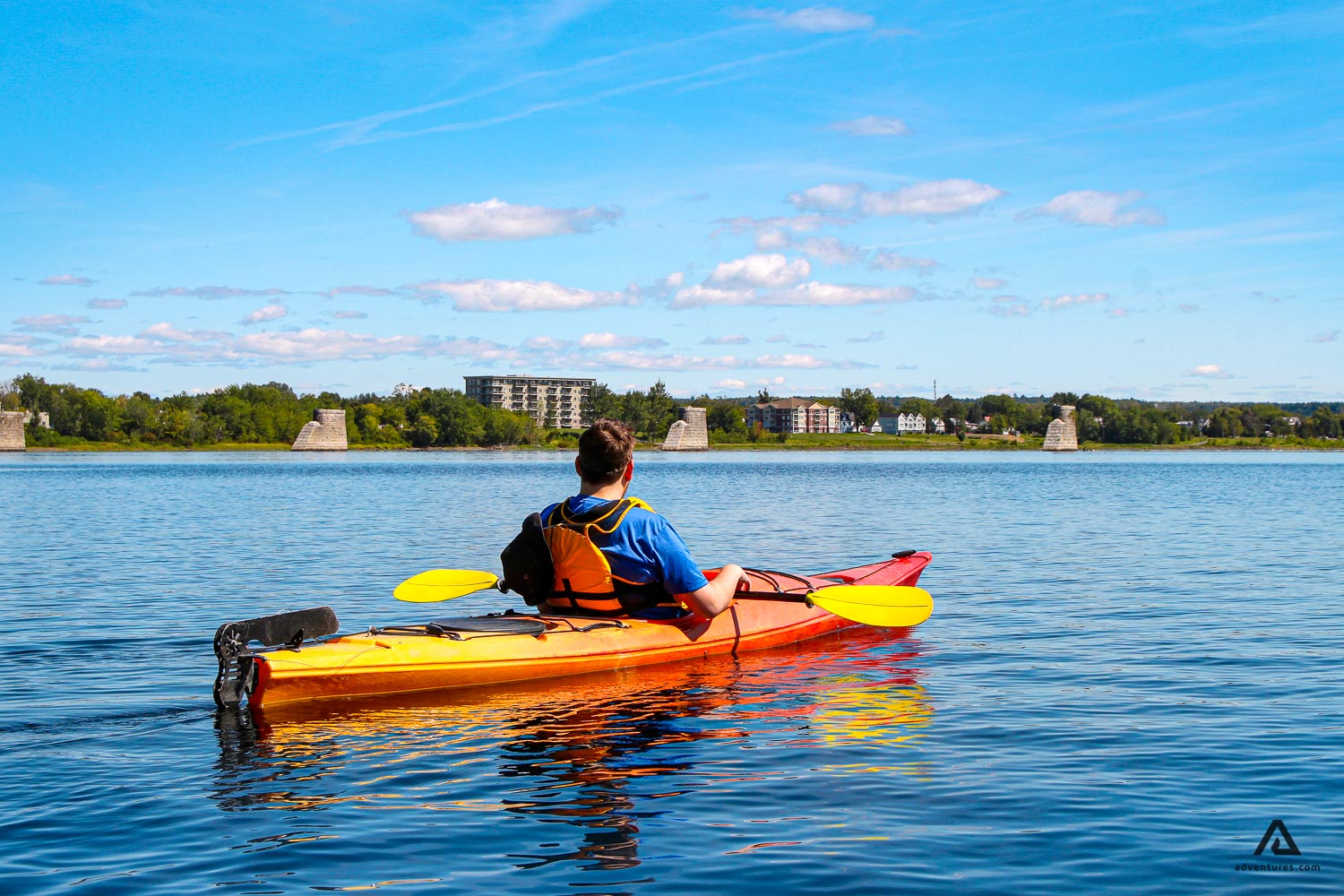 Man kayaking on river