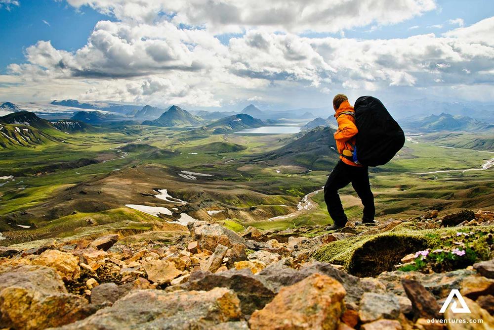 Man with backpack in the Landmannalaugar valley