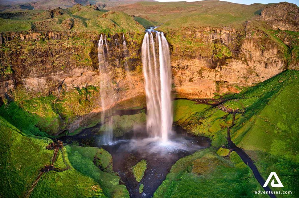 aerial view of seljalandsfoss waterfall at sunset