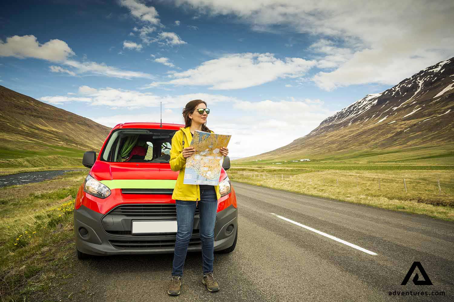 woman trying to find directions on a map
