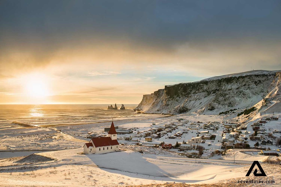 sunset in winter at vik in south iceland