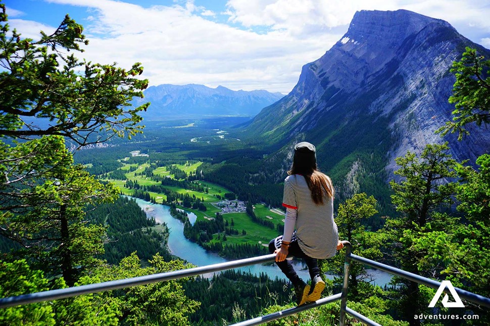 sitting on the viewing platform at banff national park in canada