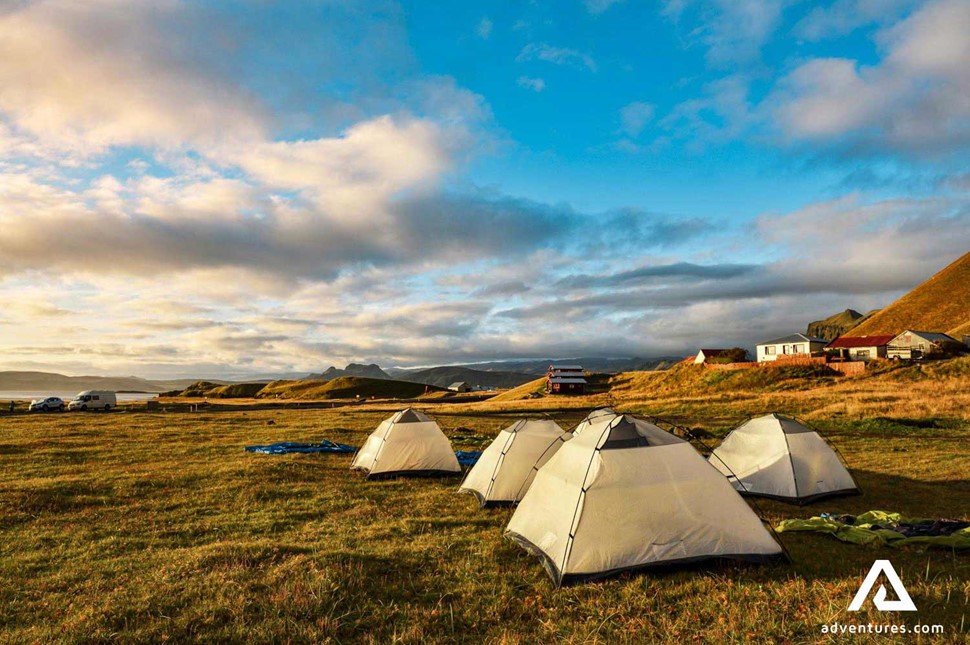 pitched up tents at sunset in iceland